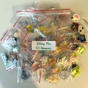 Disney collector pins with Mickey rubber backings